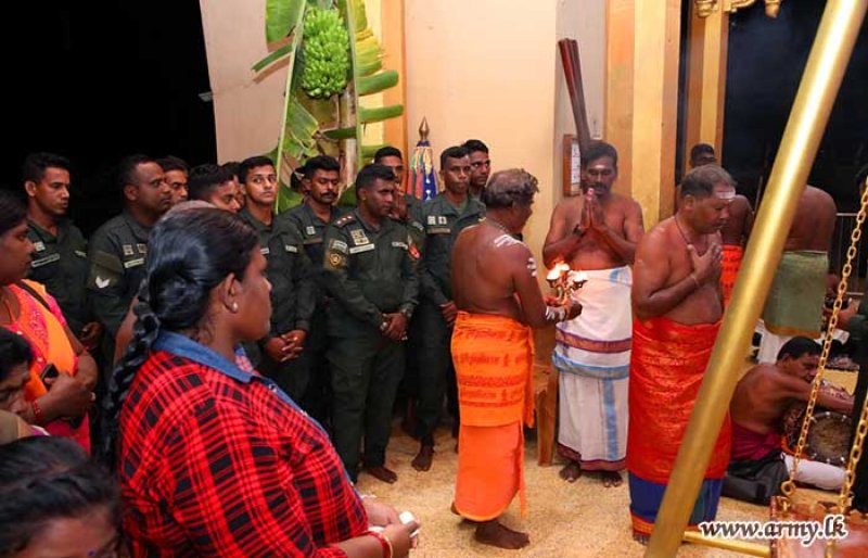 Army help water cutting ceremony at Marimuthu Amman Temple