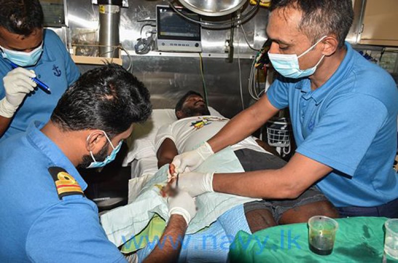  Surgery at sea: Navy brings ashore injured fisherman