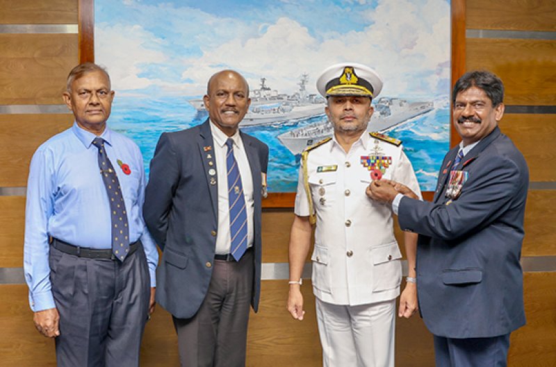 Poppy flower pinned on Commander of the Navy