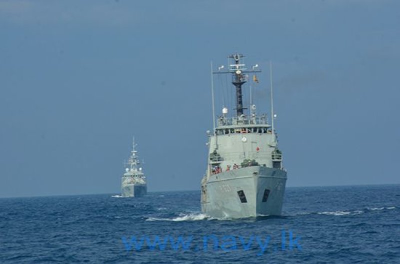 HMS SPEY of the Royal Navy departs island