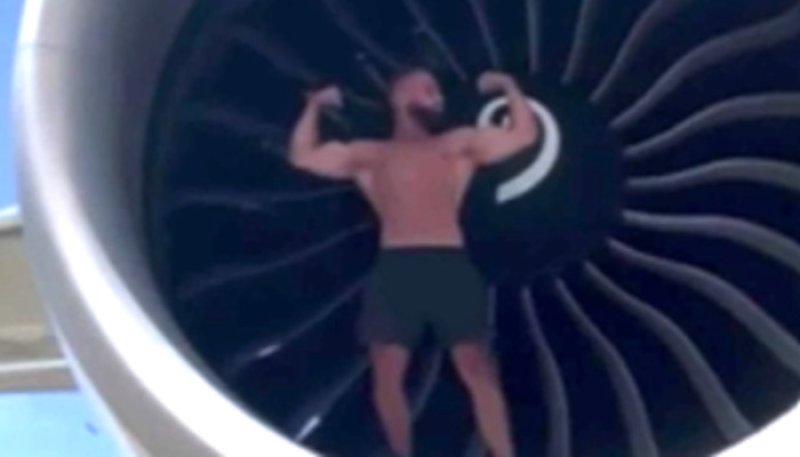 Man Riding Jet Engine Bodybuilder Jumps Into Moving Plane Engine