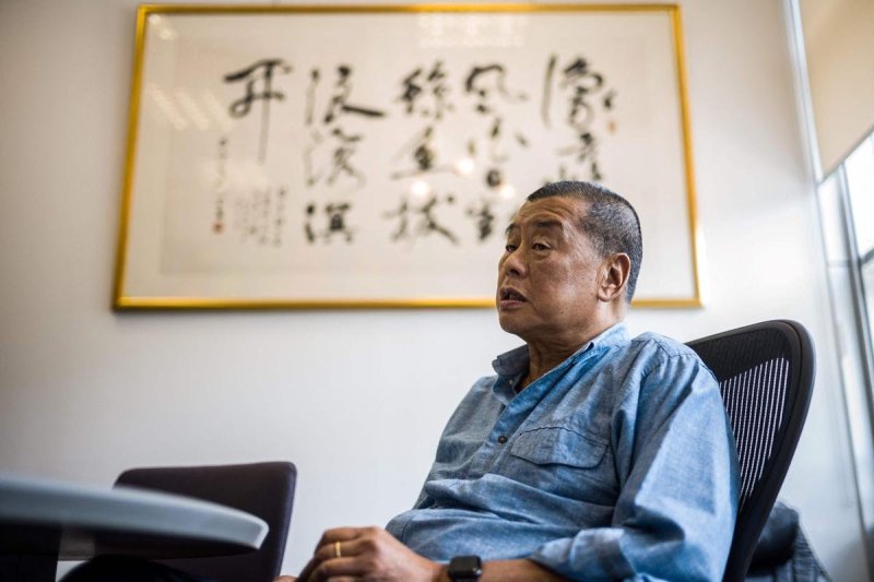 Hong Kong tycoon Jimmy Lai sentenced to 20 years 
