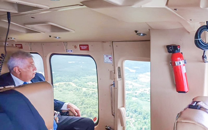 President takes to the air to assess the disaster situation 