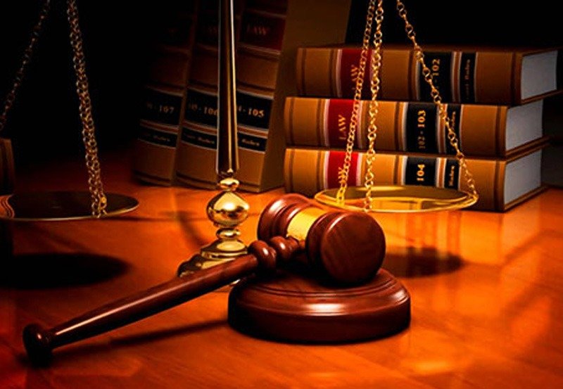 Woman and ex-cop accused of job fraud, remanded