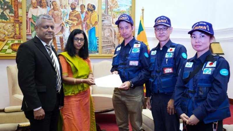 Japan disaster relief medical team calls on Foreign Ministry