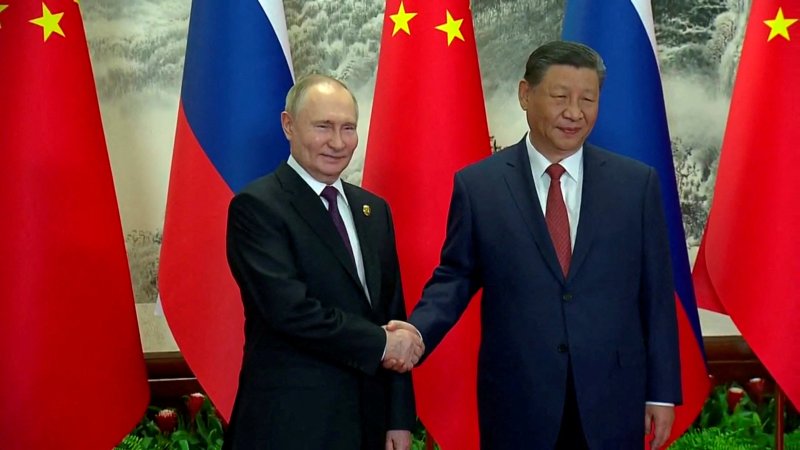 Xi lauds China-Russia ties as Putin lands in Beijing