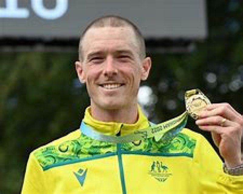  Ex-cycling world champion charged with killing his wife