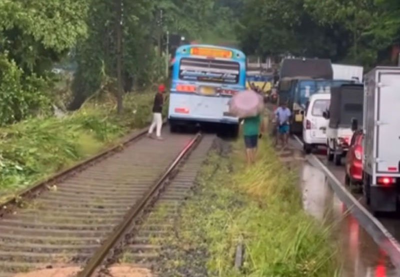 Driver arrested for driving bus on railway track