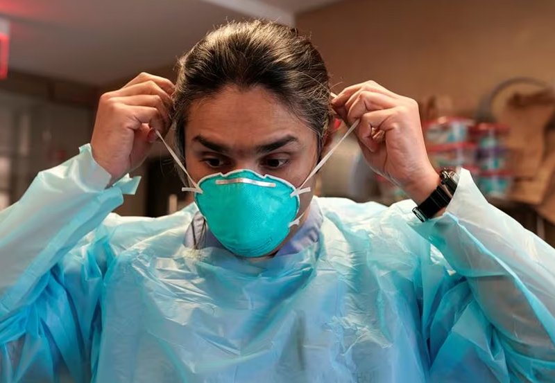 Mask mandates return at some US hospitals as COVID, flu jump