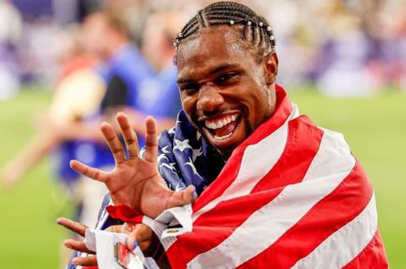 Lyles wins sensational 100m gold by 0.005 seconds