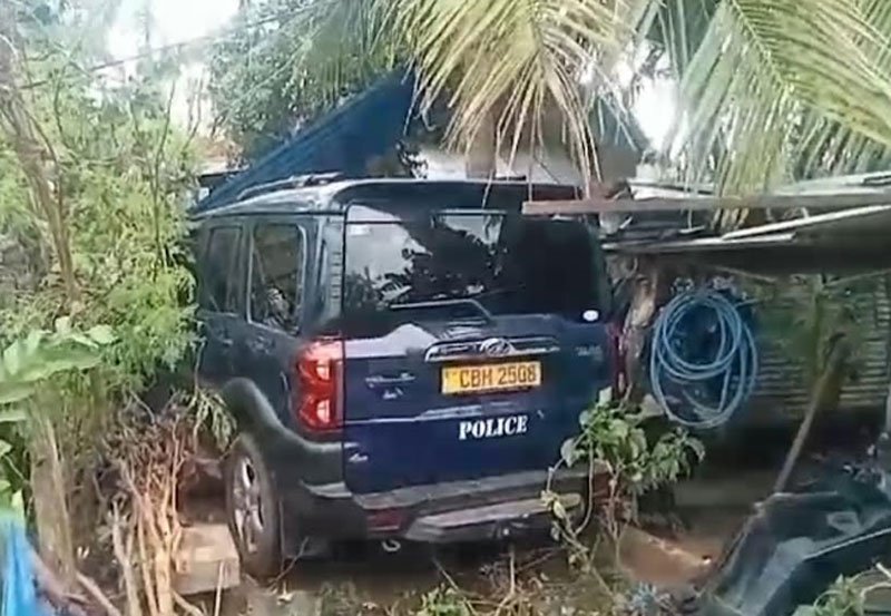 Police officers injured as jeep crashes into house