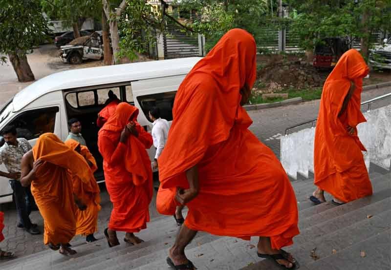 Court orders detention of 22 monks over airport drug bust