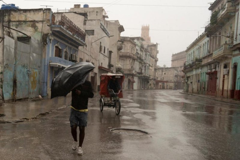 Whole of Cuba loses power as Hurricane Rafael hits