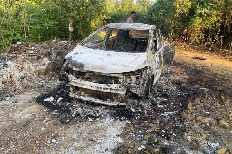 Monk's assailants torch getaway car in daring act