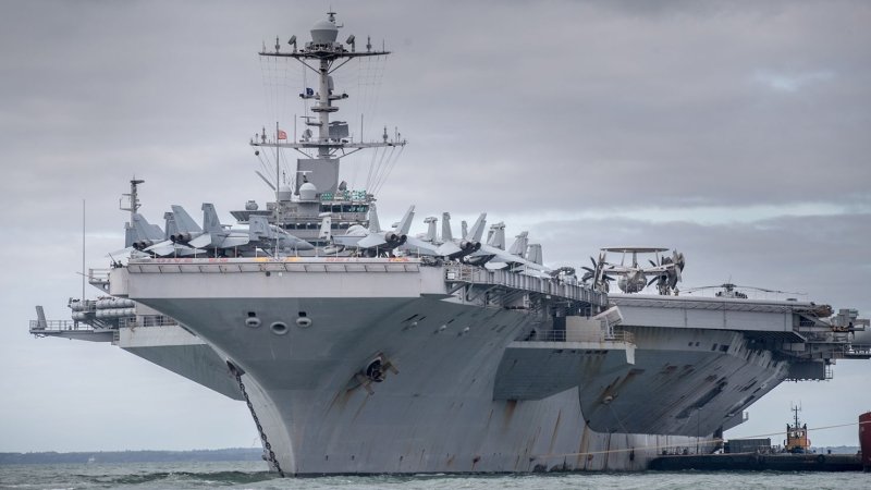US Navy aircraft carrier collides with merchant ship
