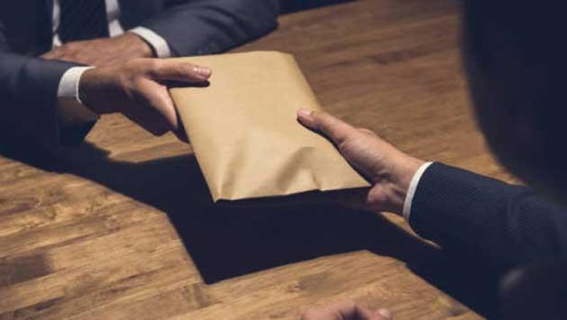 Deputy Commissioner arrested  for taking Bribe
