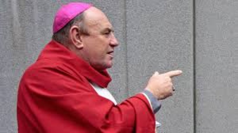 Former Australian bishop charged with historical sex offense