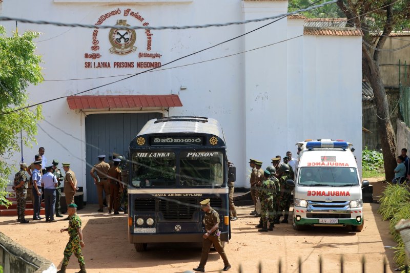 Indian inmate buried under tight security