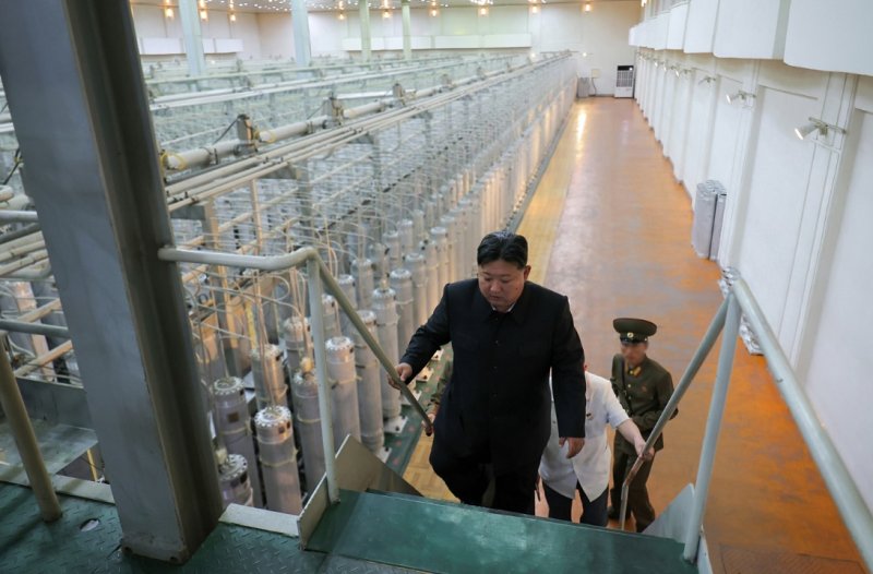 N Korea releases rare photos of Kim at uranium facility