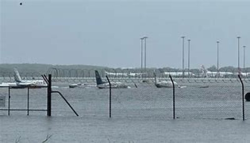 Airport submerged and crocodiles seen after record rain